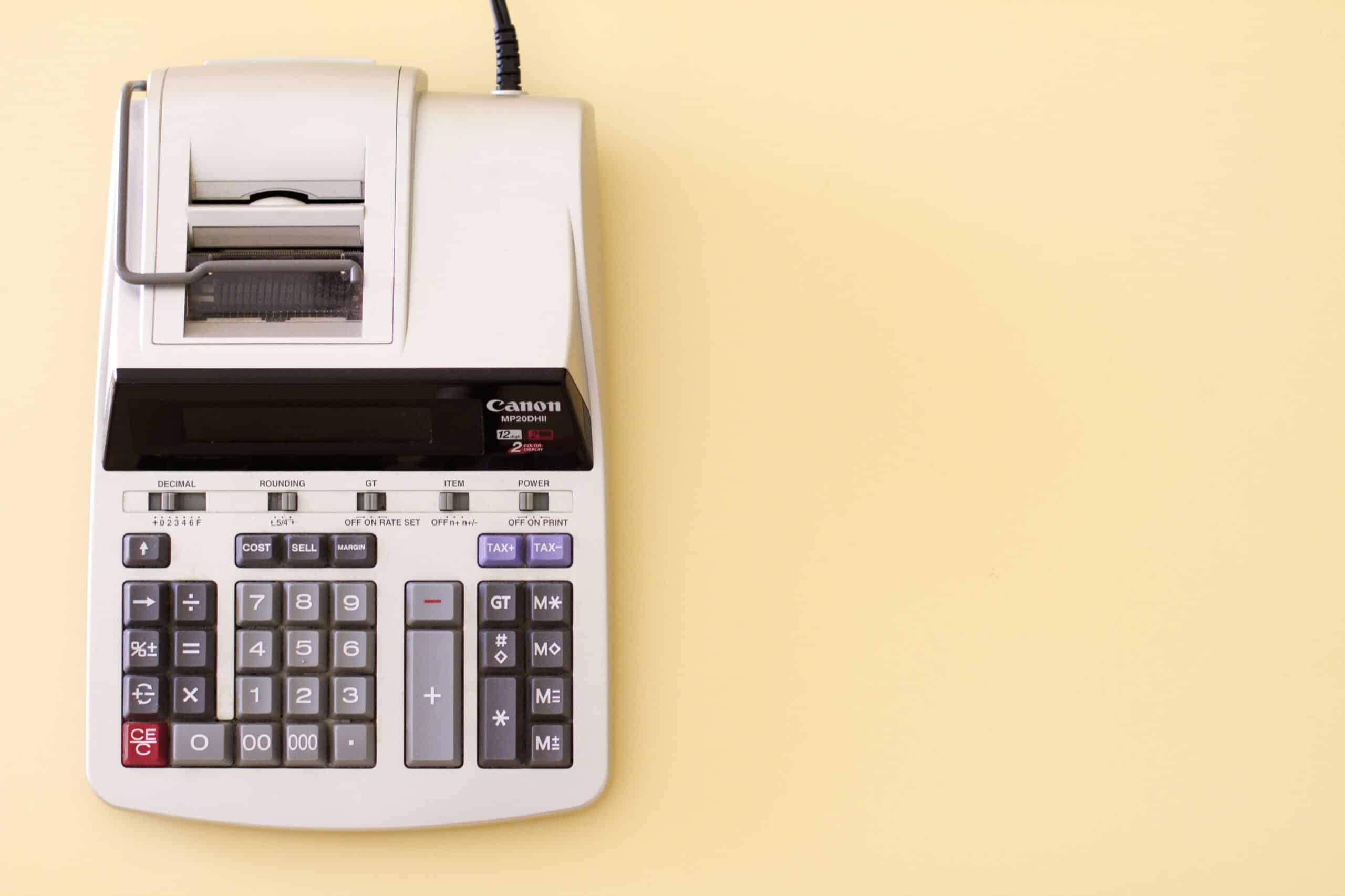 Is your PPC budget driving maximum ROI? 1 A printing calculator which symbolizes PPC budgets here.