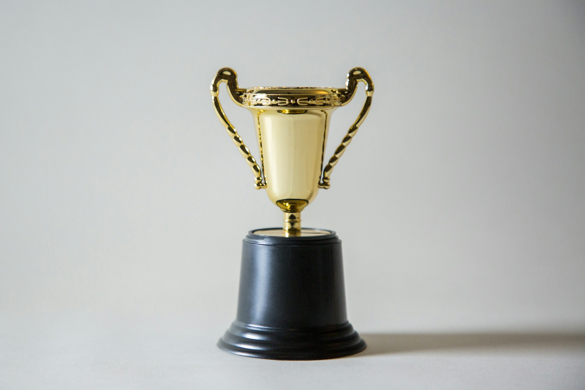Why humans still win (for now): Human-first conversion in an AI world 1 Photograph of a trophy against a white background.